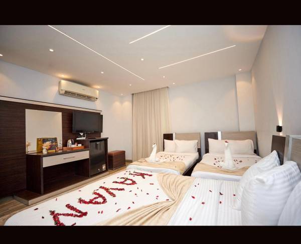 Chambre Quadruple Deluxe
